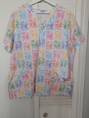 3/ $30 Disney White Short-Sleeve V-Neck Scrub Top Multicolor Character Print